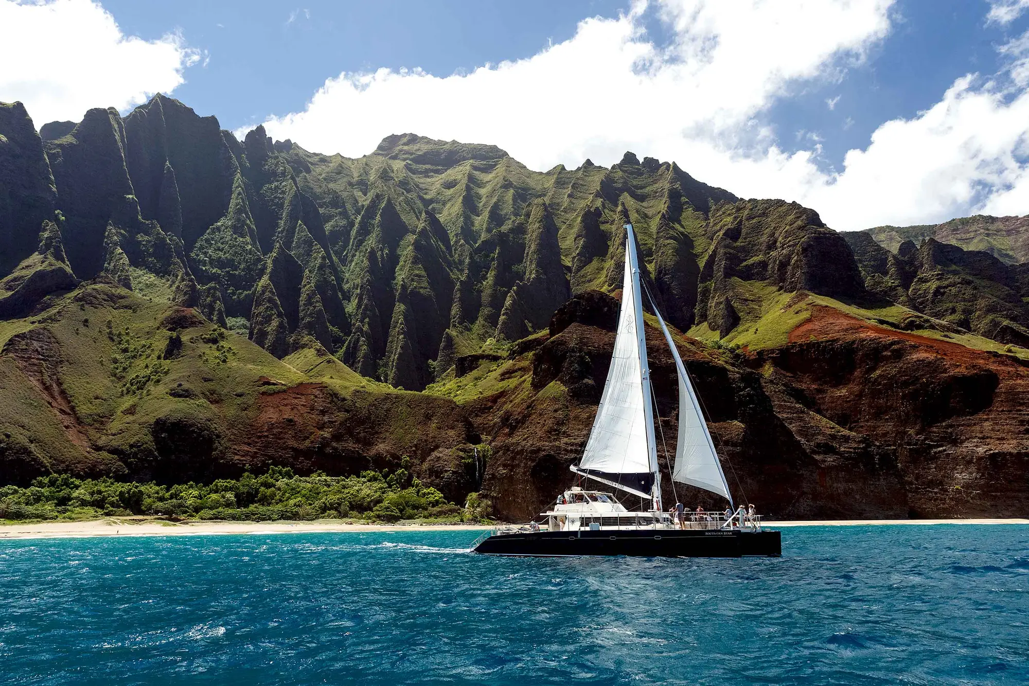 The Southern Star under sail along the Na Pali coast